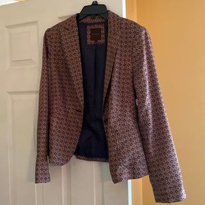Blazer, one button missing on sleeve